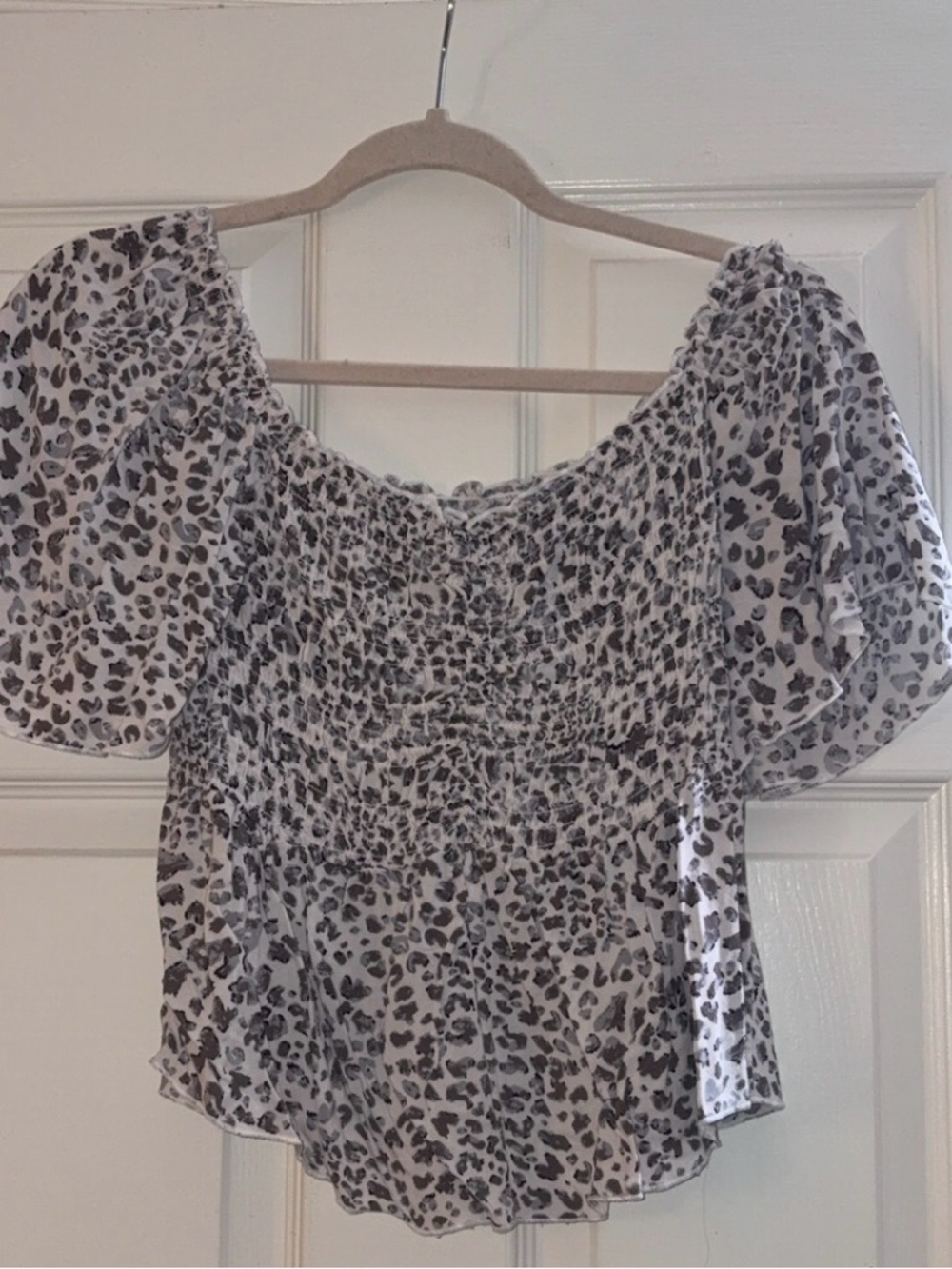 Women’s Smocked Off-Shoulder Top in Black & White Leopard